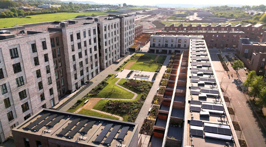 Drone shot across the green private Resident's Garden nestled between the new houses and apartments at Brabazon.
