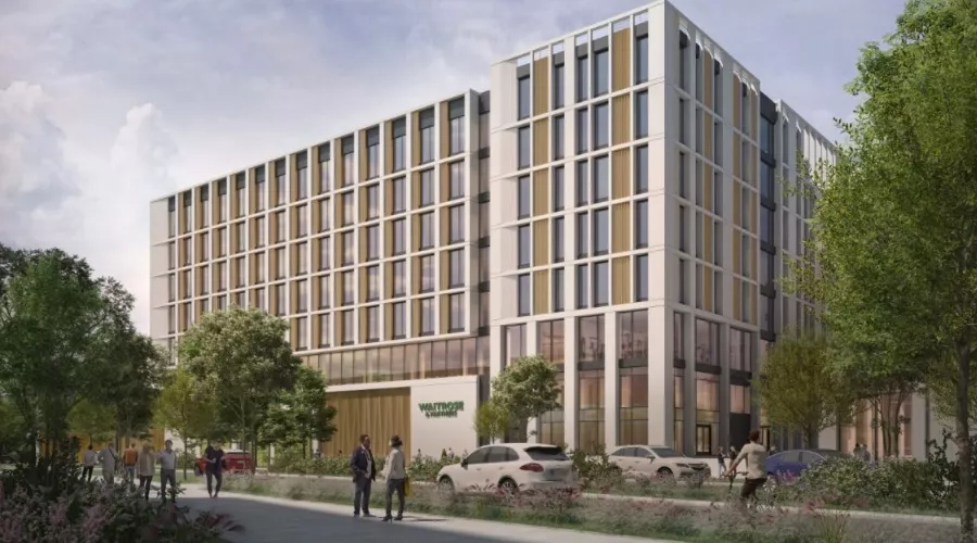 CGI of One Brabazon Gateway - a modern multi-storey building with large windows, surrounded by trees and pedestrians on a sidewalk.
