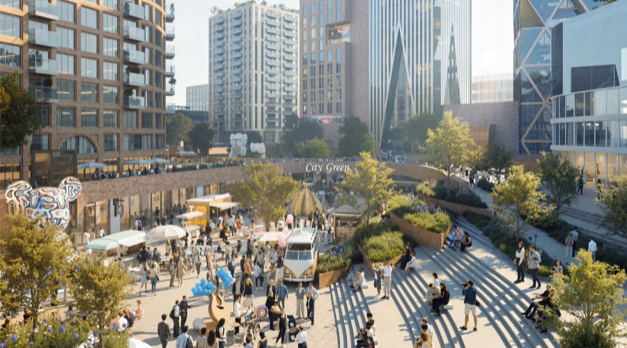 Computer-generated image of City Green at Brabazon busy with people.